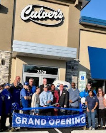 Chamber members celebrating a local business grand opening in Hope Mills, NC